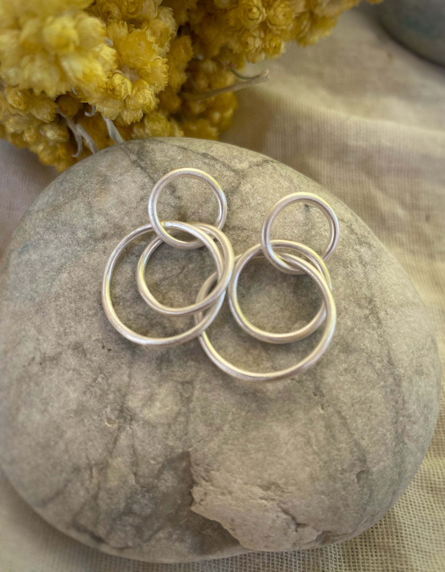 Irregular triple silver hoops