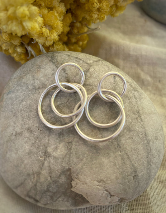 Irregular triple silver hoops
