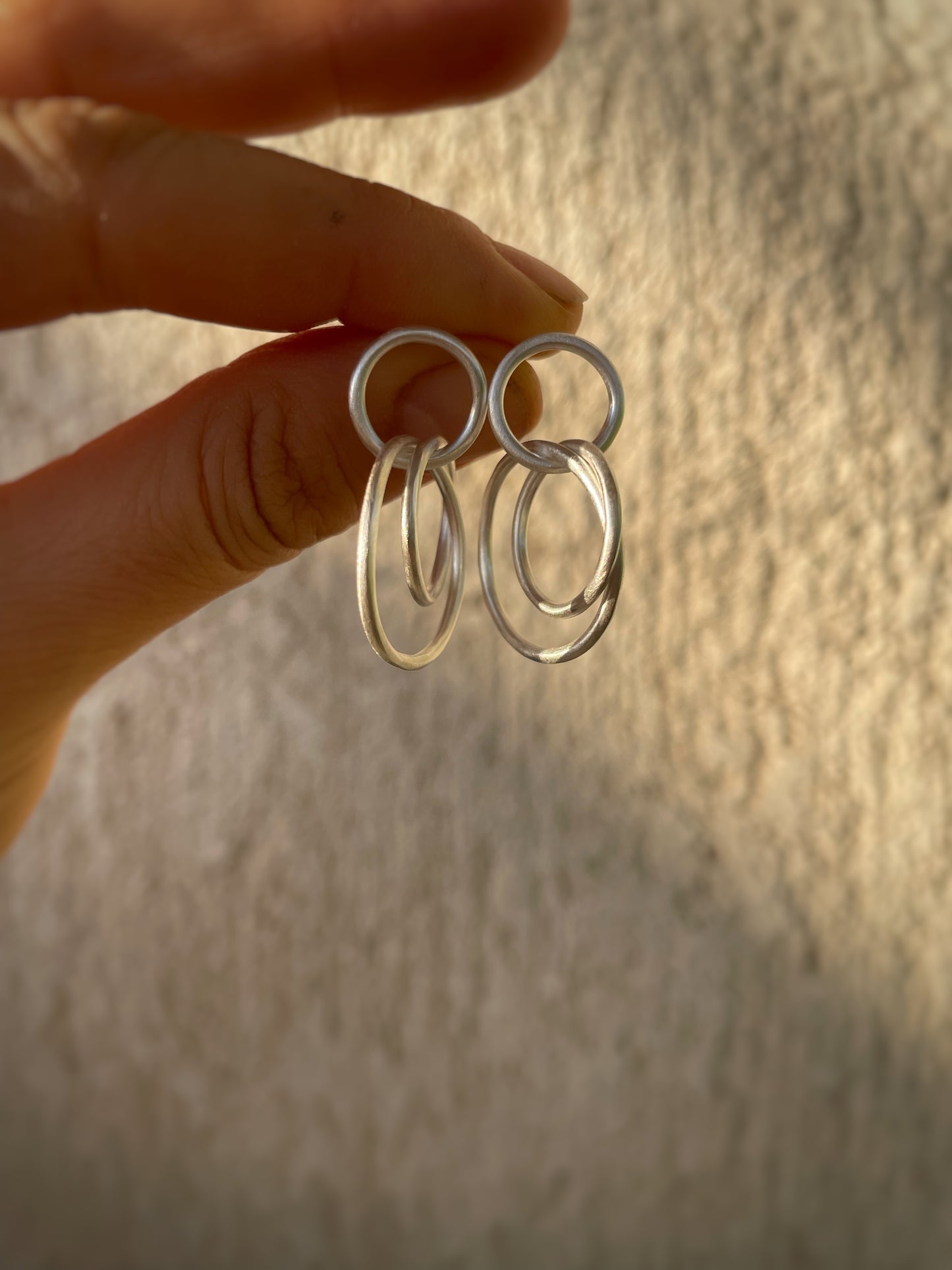 Irregular triple silver hoops