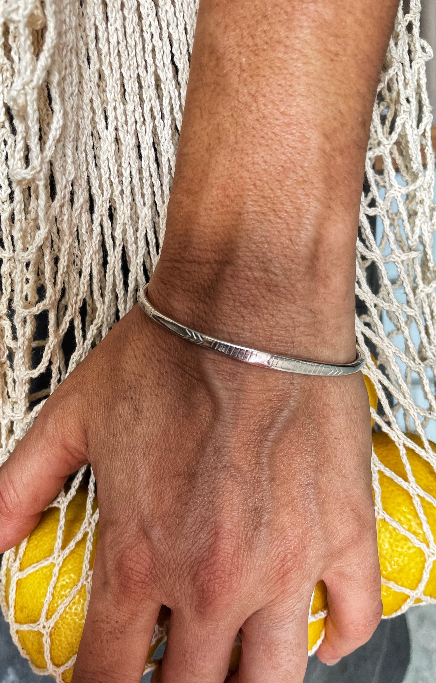 Engraved open silver bangle