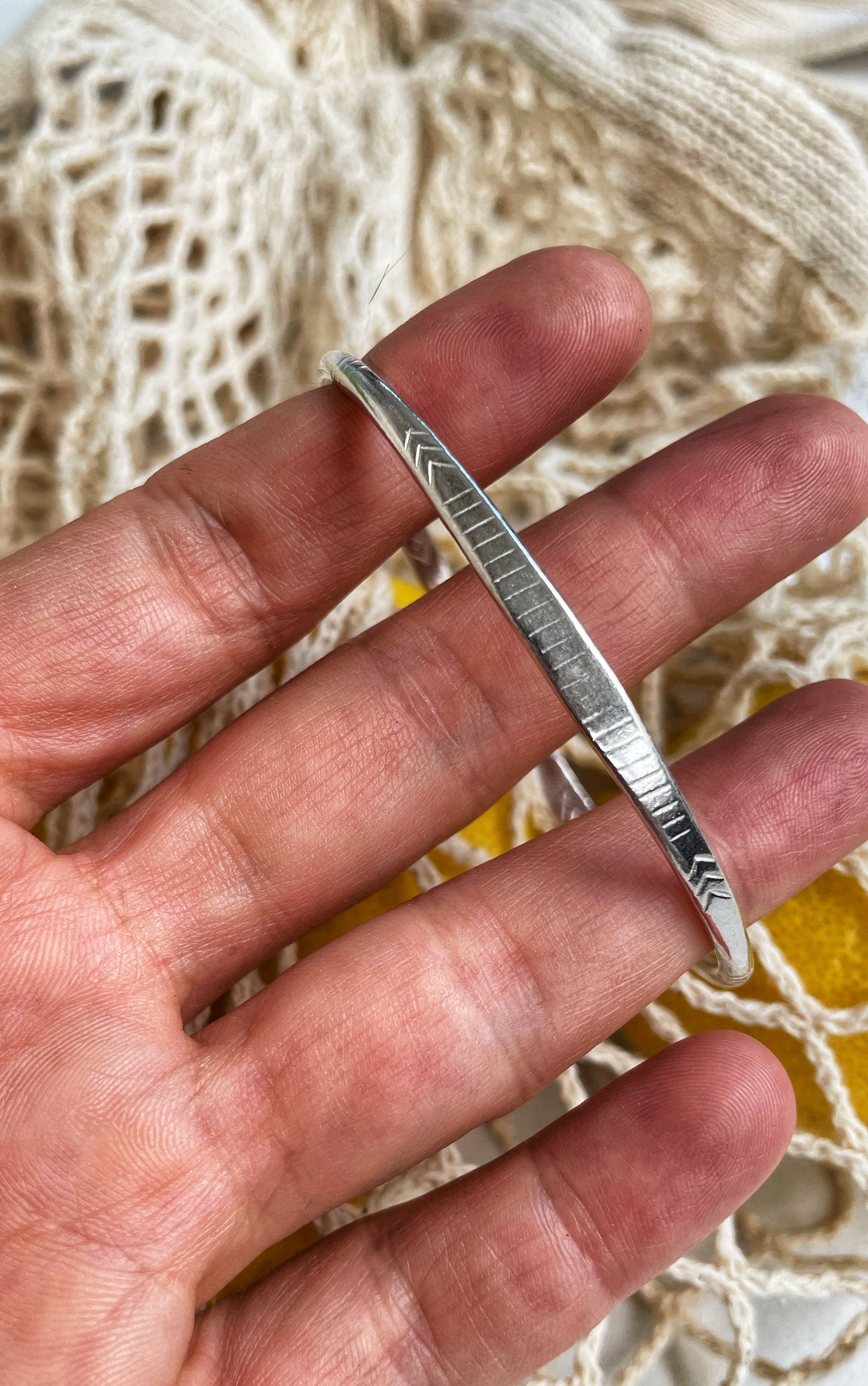 Engraved open silver bangle