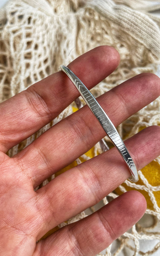 Engraved open silver bangle