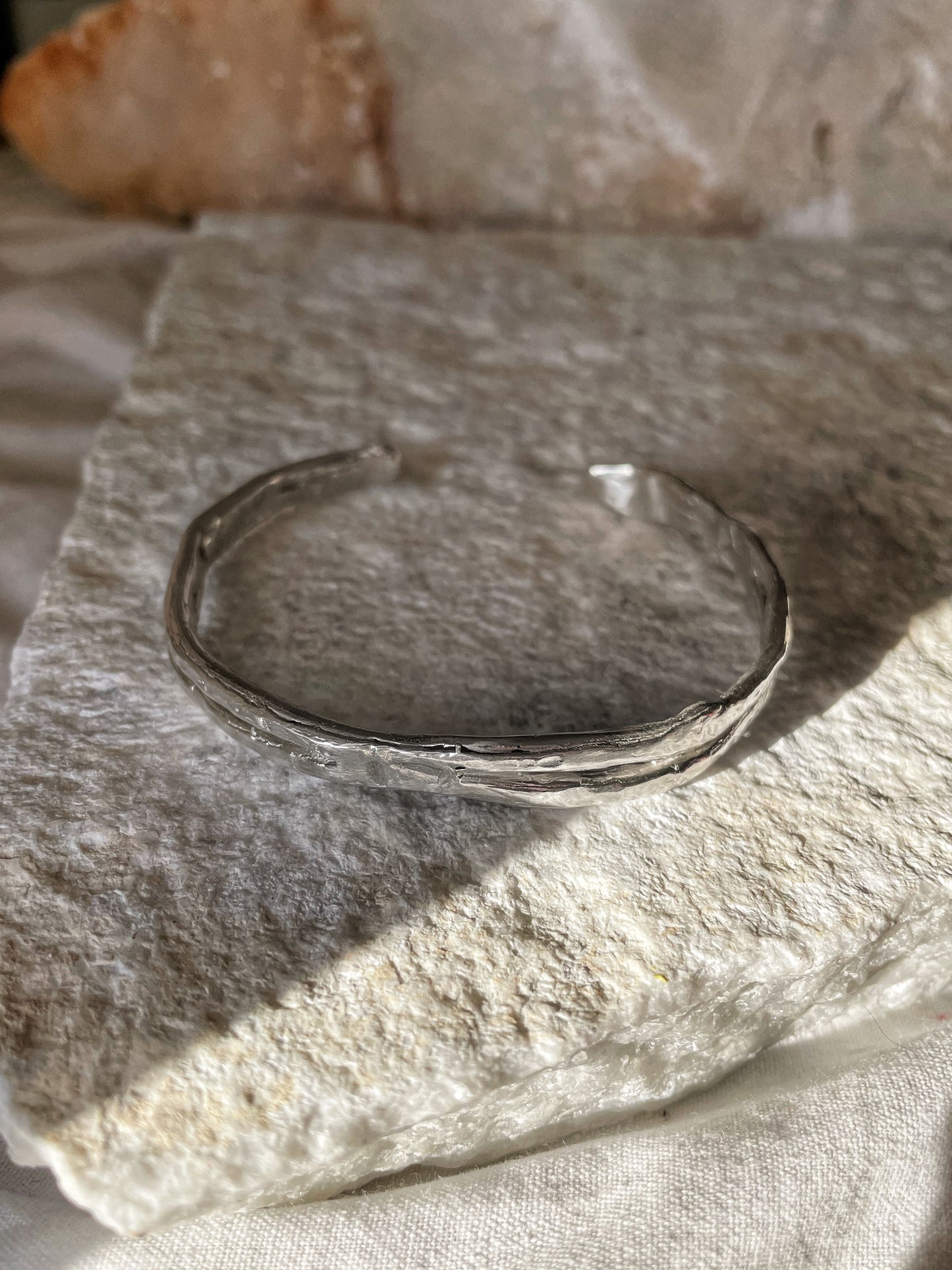 Raw silver open bangle