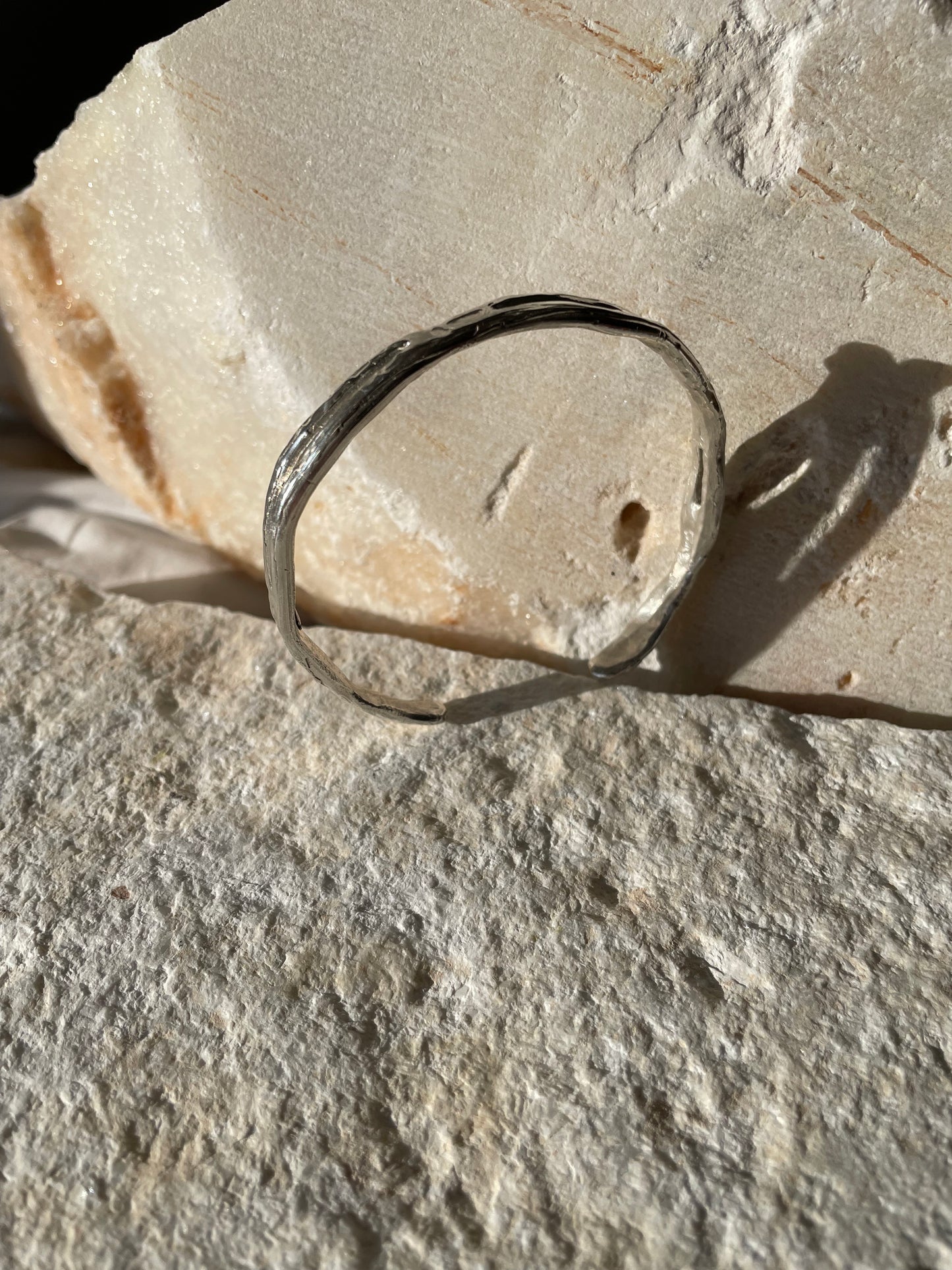 Raw silver open bangle