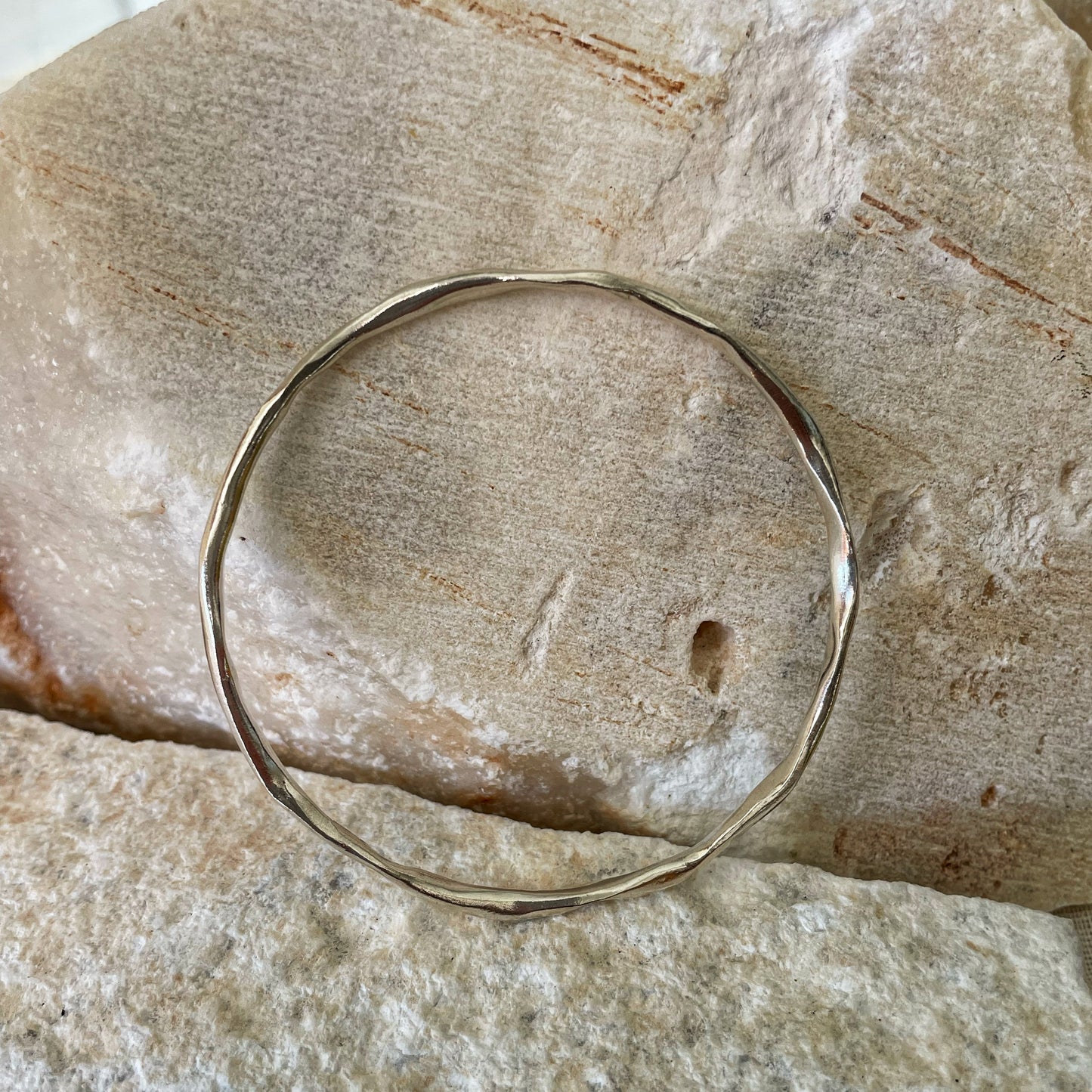 Raw silver bracelet