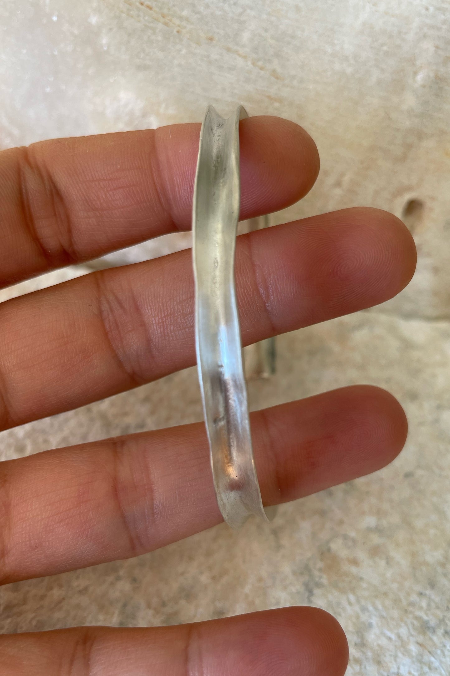 Irregular open silver bangle