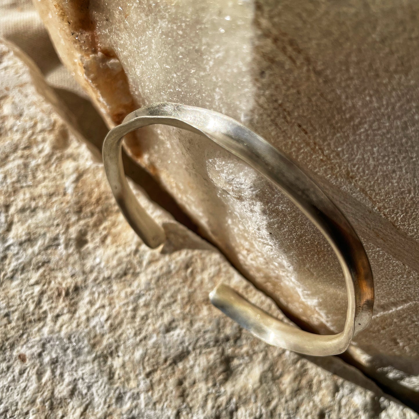 Irregular open silver bangle