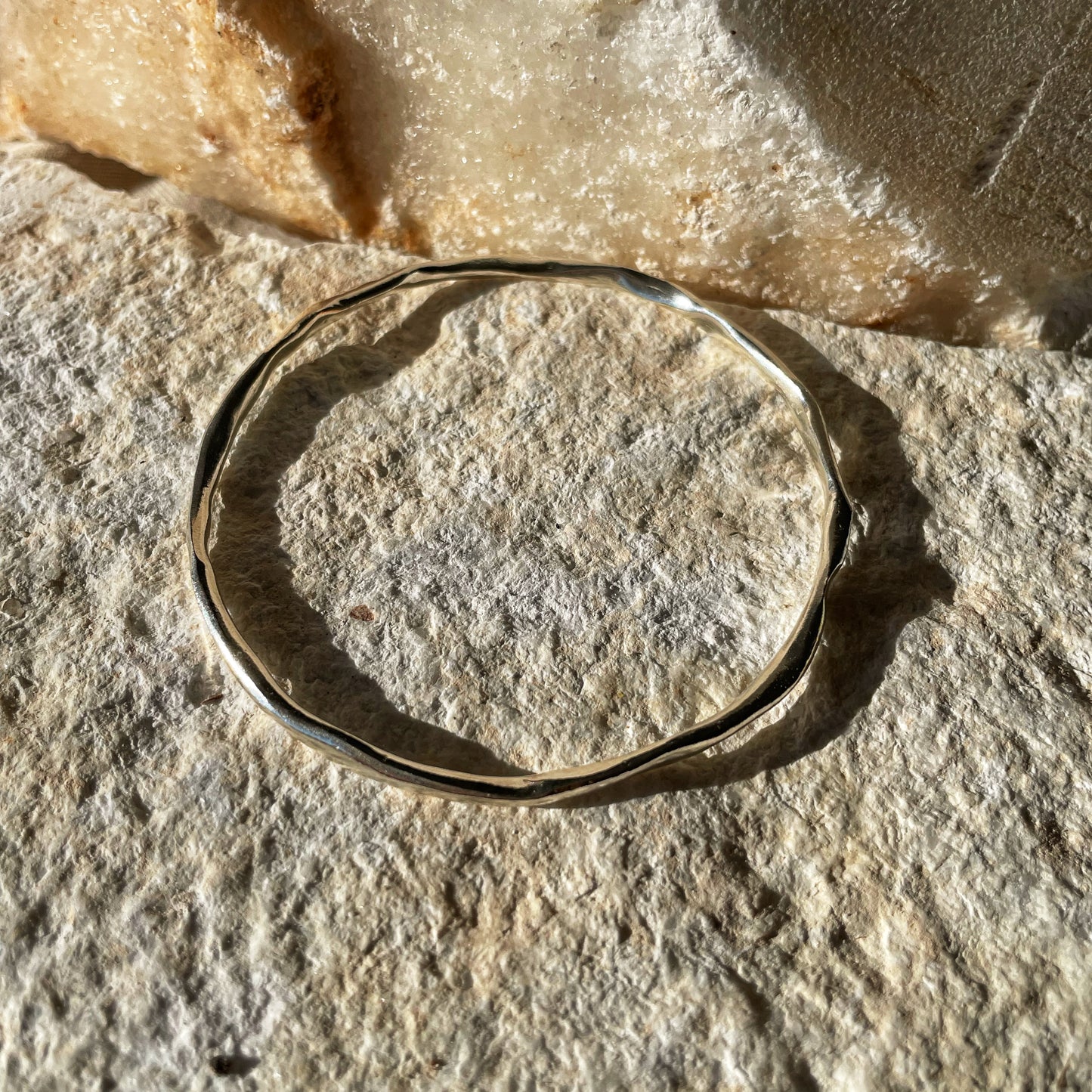 Raw silver bracelet