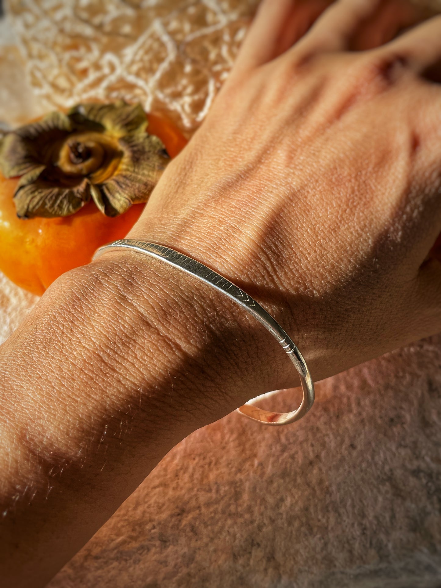 Engraved open silver bangle