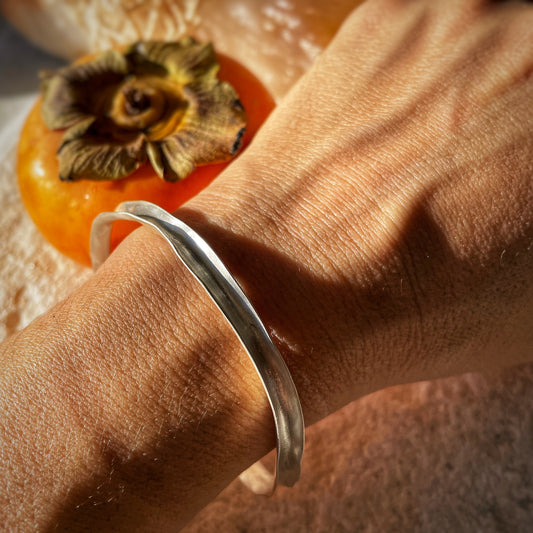 Irregular open silver bangle