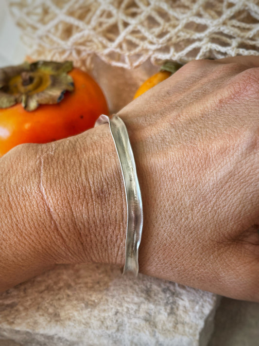Irregular open silver bangle
