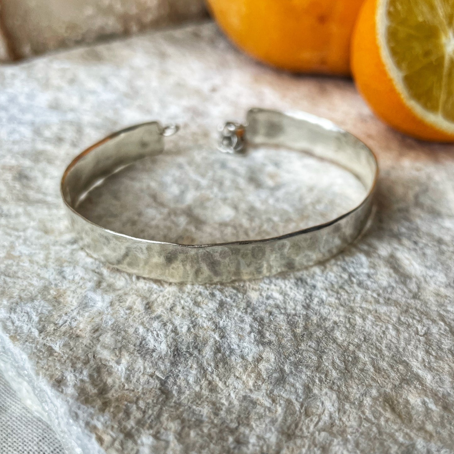 Forged open silver bangle