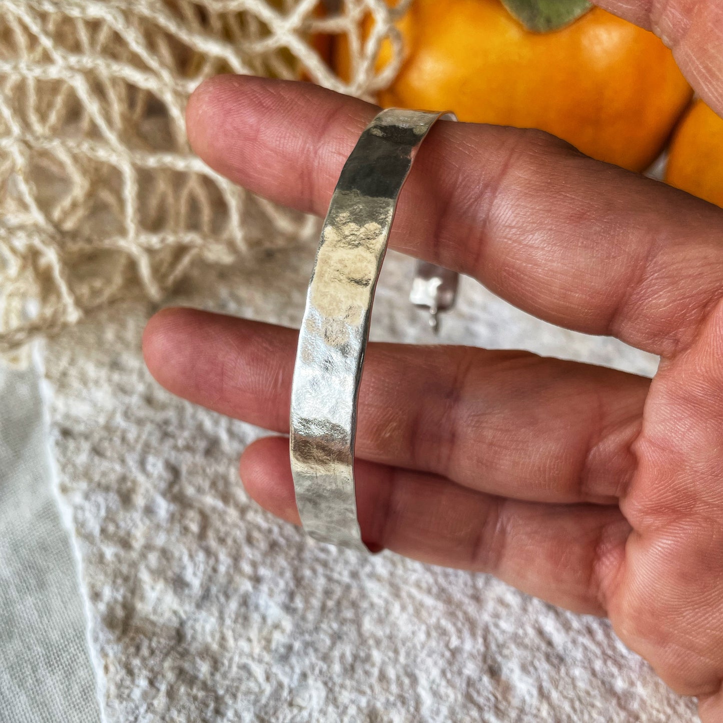 Forged open silver bangle