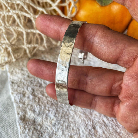 Forged open silver bangle
