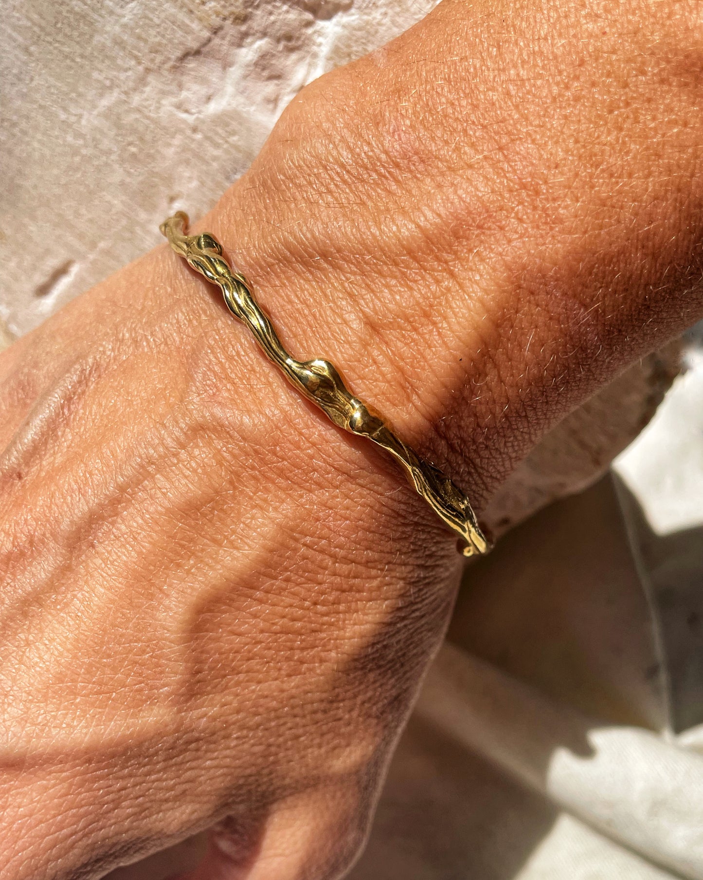 Flow brass bangle