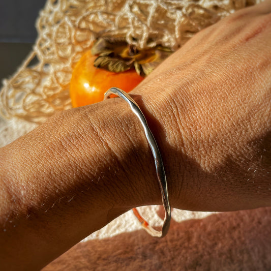 Raw silver bracelet