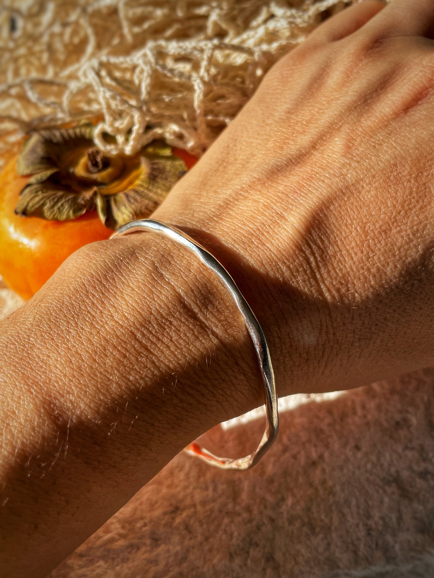 Raw silver bracelet